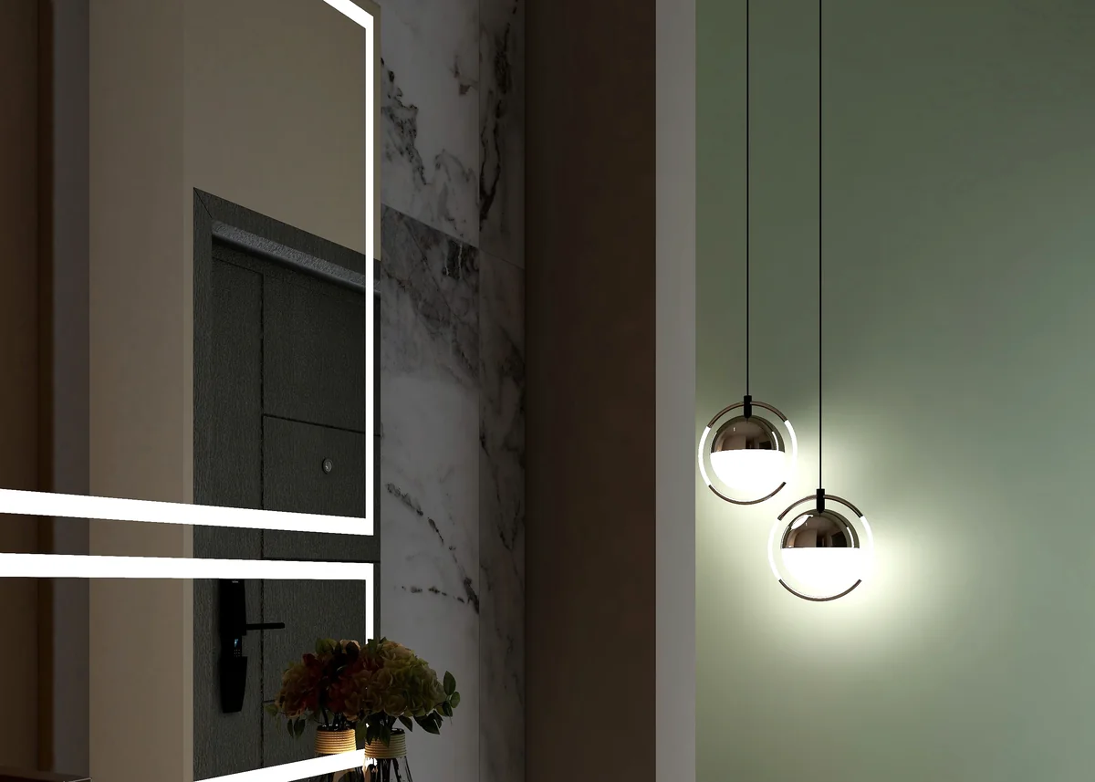 Soft mirror lighting and glowing pendant lights in a calm, sage-toned interior